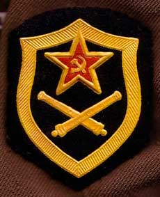 Нарукавный знак по роду войск (службе) Ракетных войск и артиллерии, ракетных войск стратегического назначения, зенитно-ракетных войск, войск ракетно-космической обороны.
